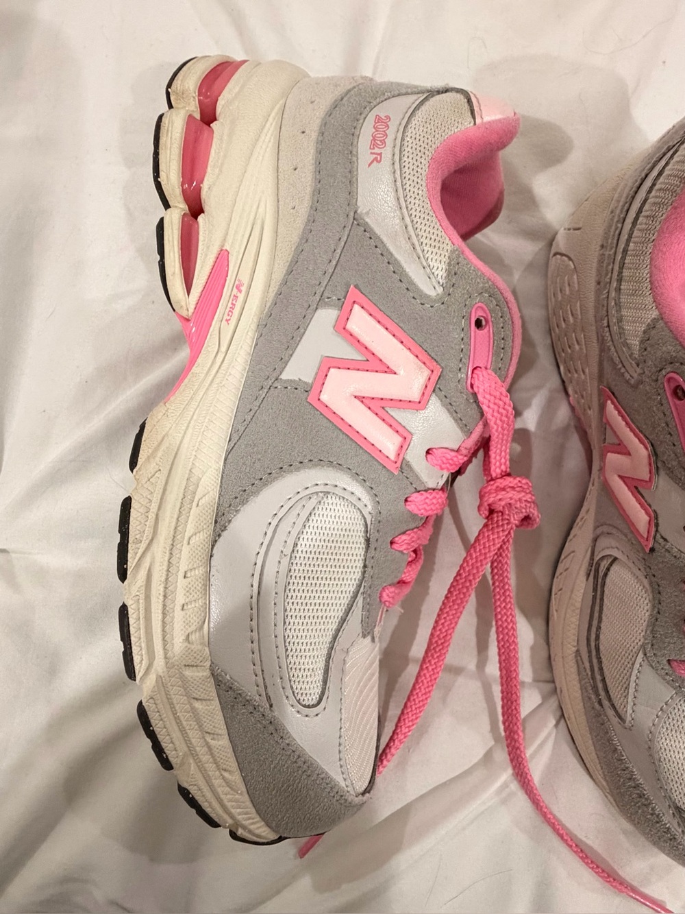 New Balance Women’s Gray and Pink 2002R Athletic Sneakers